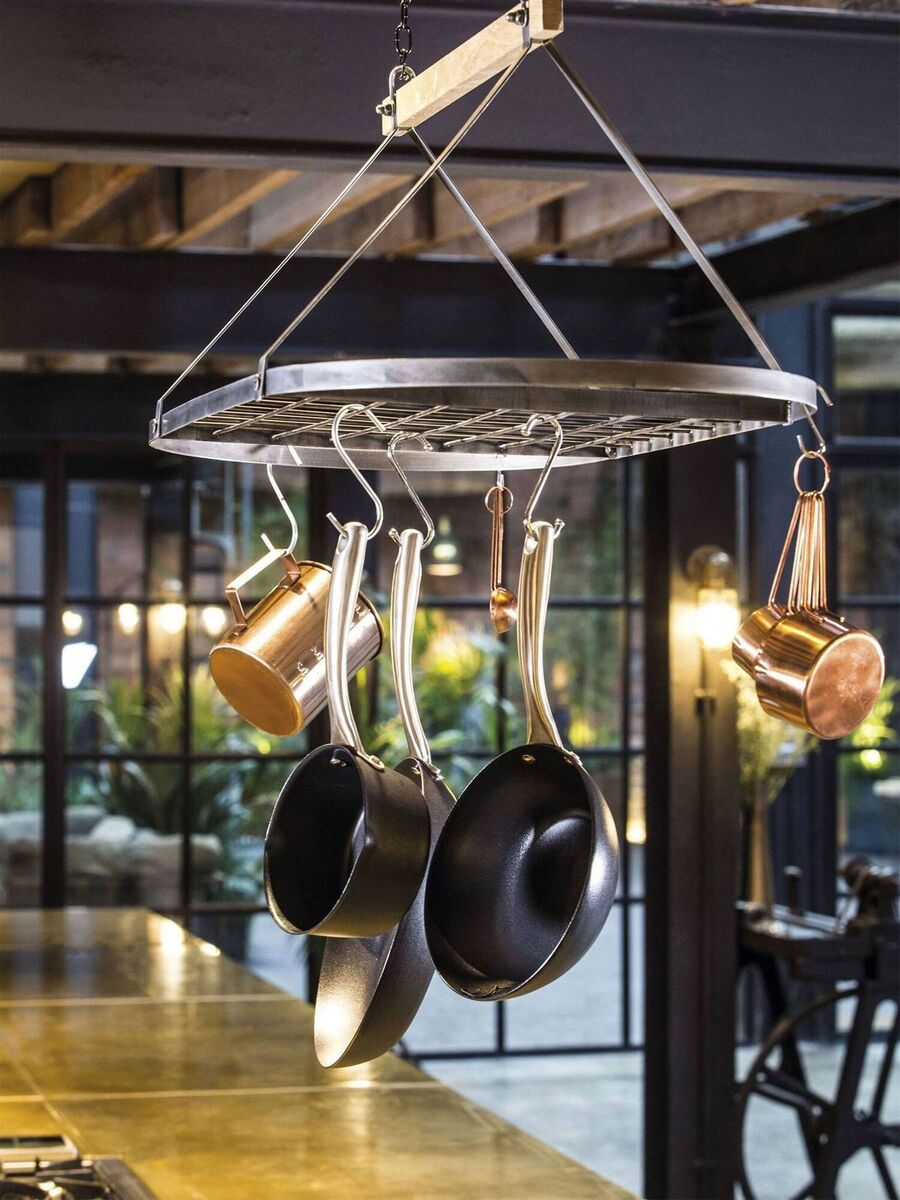 Ceiling pot racks are widely available of you can make your own in a variety of ways. This KitchenCraft model is a mash-up of industrial with antique styling in no-nonsense wrought-iron and mango wood, great for hooks for utensils too. Always check those load ratings and install with care; €61, Next.ie.