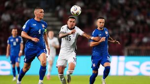 <p>NEXT GAZZA?: Serbia's Nikola Milenkovic under pressure from England's Morgan Rogers. Pic: Bradley Collyer/PA Wire.</p>
