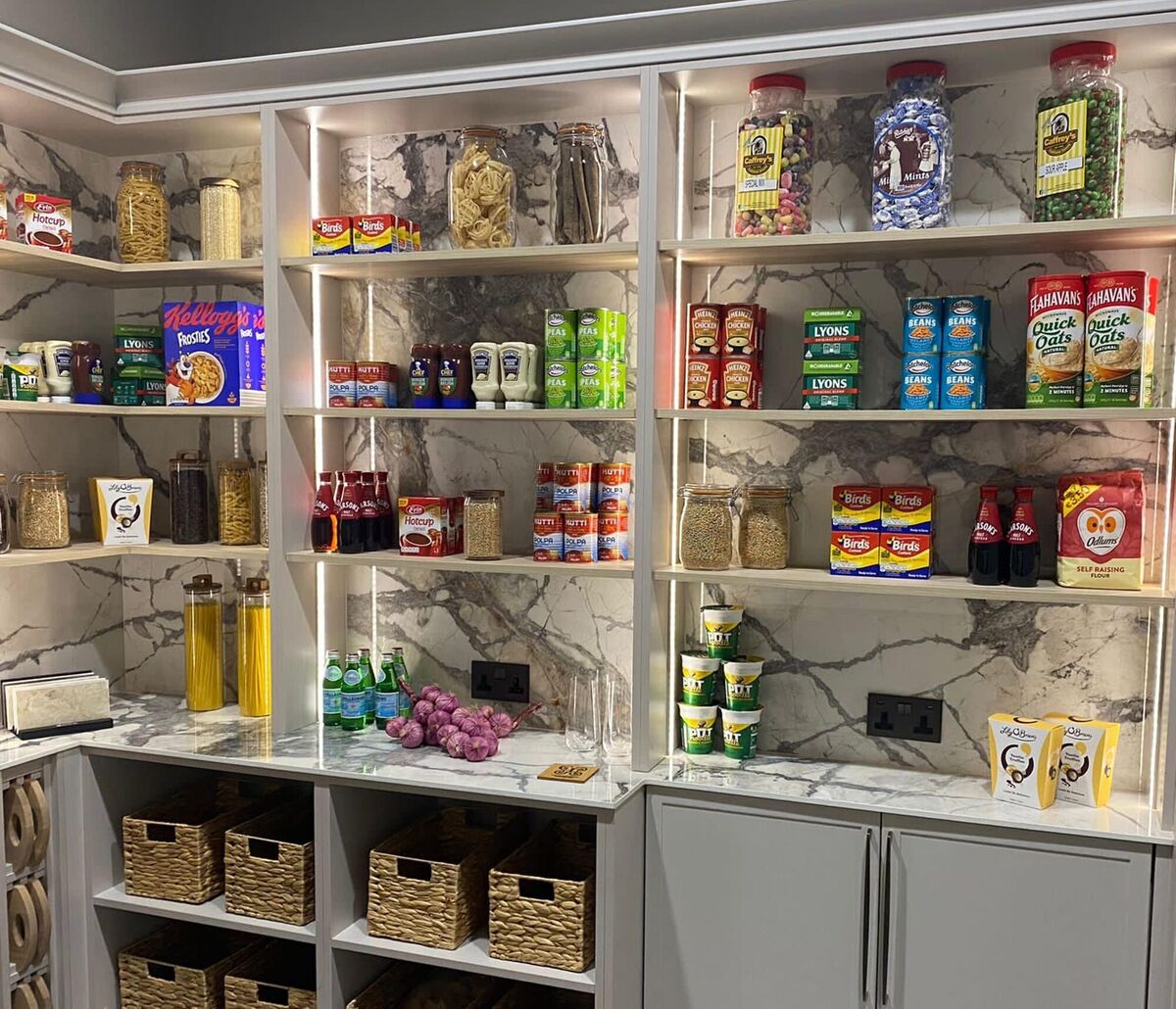 Pantry detailed with counter and cabinet backs in beautifully veined 12mm Xtone Porcelain slabs. Super slim Shaker doors finished in Cashmere. Courtesy of Celtic Interiors, St. Patrick's Woollen Mills, Douglas, celticinteriors.com.