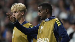<p>Sweden's Alexander Isak watches from the sideline during the World Cup qualifer. Pic: AP Photo/Darko Bandic.</p>