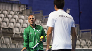 <p>DAVIS CUP: Ireland captain Conor Niland speaks with Peter Buldorini. Pic: ©INPHO/Tom Maher</p>