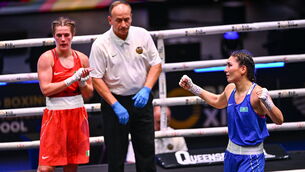 <p>BRONZE MEDAL: Kazakhstan Aida Abikeyeva, right, celebrates after defeating Ireland's Grainne Walsh in their Women's 65kg semi-final bout during the World Boxing Championships. Pic:  Ben McShane/Sportsfile</p>