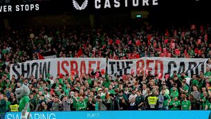 <p>Fans display a "Show Israel the red card" banner at the Aviva. Pic: ©INPHO/Ryan Byrne.</p>