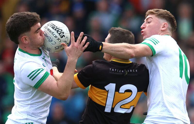 Na Gaeil’s Oison Maunsell with James O’Connor come up against Brian Looney of Dr Crokes. Pic:©INPHO/Bryan Keane.
