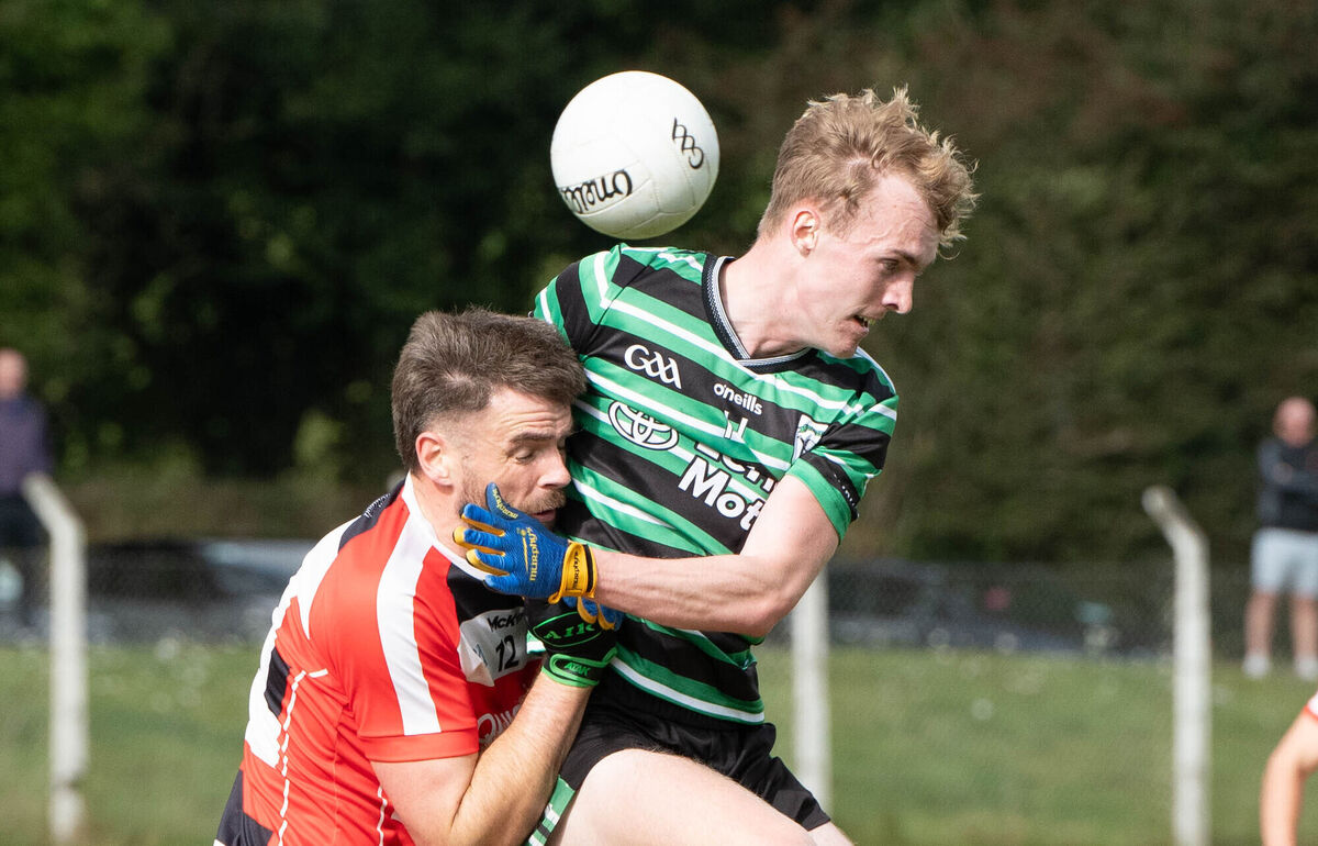 Luis Fogarty of Douglas clashes with Ballincollig's Peter O'Neill during the Senior Football Championship match in Ballygarvan. Picture: Howard Crowdy
