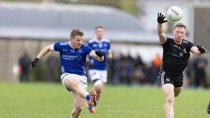 <p>Cratloe's Padraic Collins and Ennistymon's Liam Cotter in action. Picture : Eamon Ward</p>