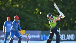 <p>George Dockrell of Ireland and Afghanistan wicketkeeper Rahmanullah Gurbaz in action. Photo by Ramsey Cardy/Sportsfile</p>