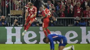 <p>Bayern's Harry Kane celebrates after scoring his side's third goal. Pic: AP Photo/Martin Meissner.</p>