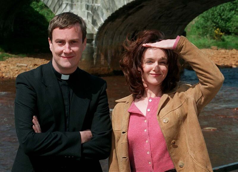 Dervla Kirwan and Stephen Tompkinson on the set of Ballykissangel. Picture: Billy Higgins  