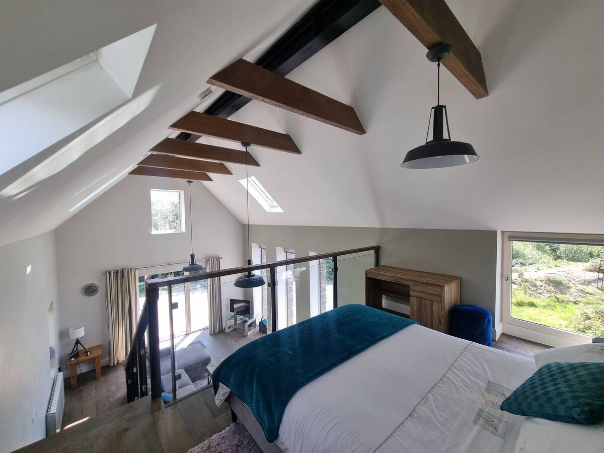 Mezzanine bedroom in guest studio/cottage