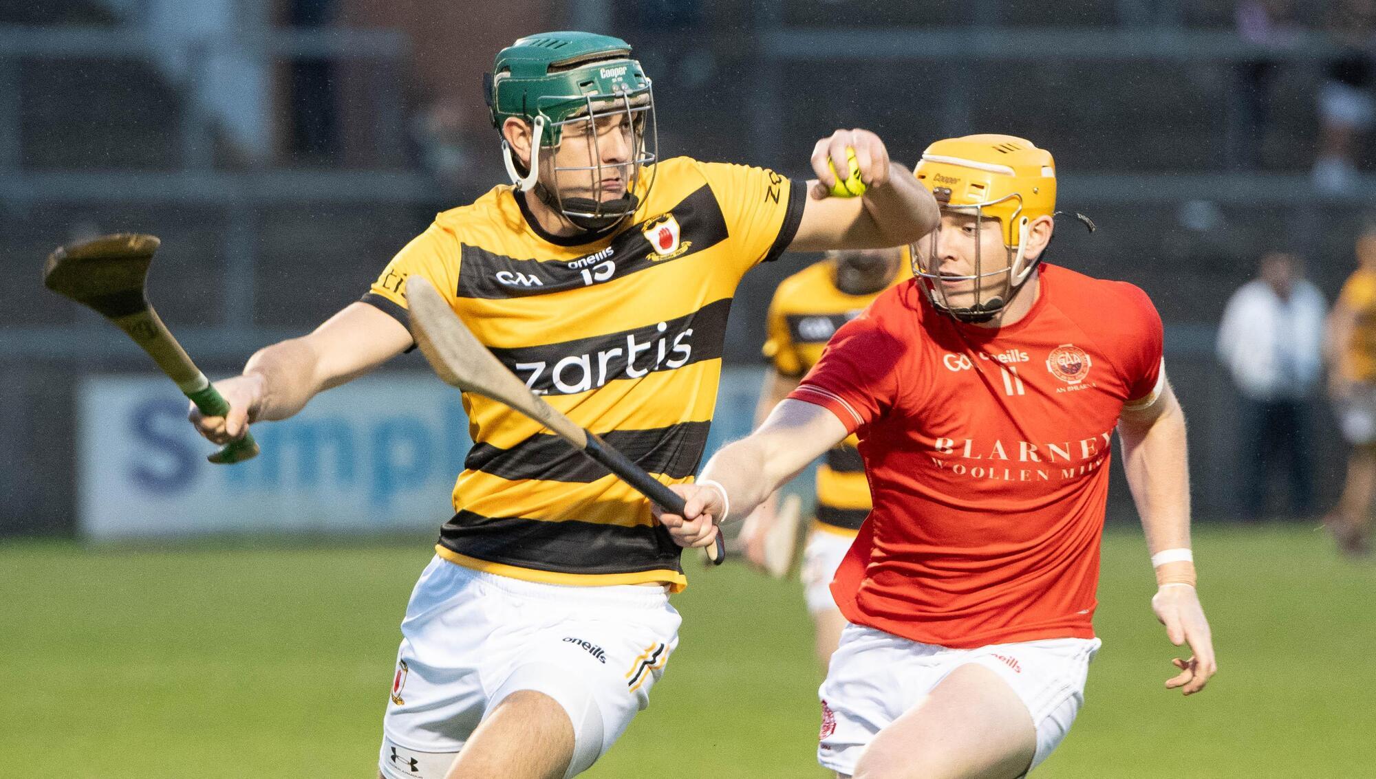 Luke Sheehan of Na Piarsaigh holds onto possession while being challenged by Blarney's Shane Barrett. Picture: Howard Crowdy