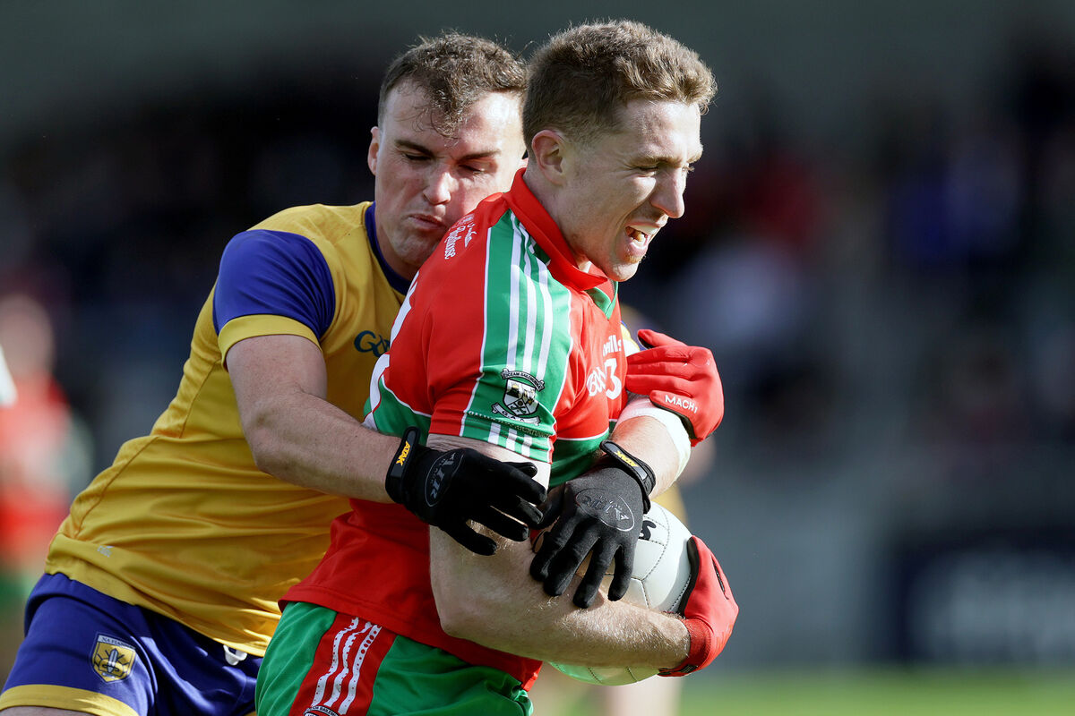 Ballymun Kickhams' Paddy Small and Adam Rafter of Na Fianna. Picture: Laszlo Geczo/Inpho