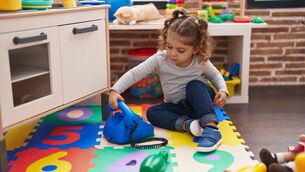 <p>Children often need gentle coaching around developing social skills, and sharing isn’t as straightforward as is often thought, but she is still very young, and you have a school year to prepare her for primary school.</p>