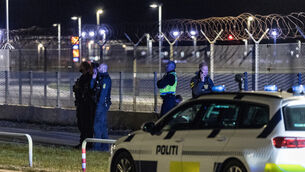 Danish police patrol at Copenhagen Airport (Steven Knap/Ritzau Scanpix via AP)