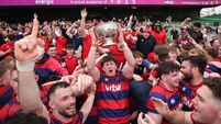 Clontarf players celebrate with supporters 27/4/2025