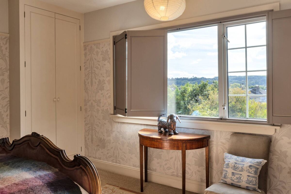 Window shutters in the main, south-facing bedroom  by Acme Blinds