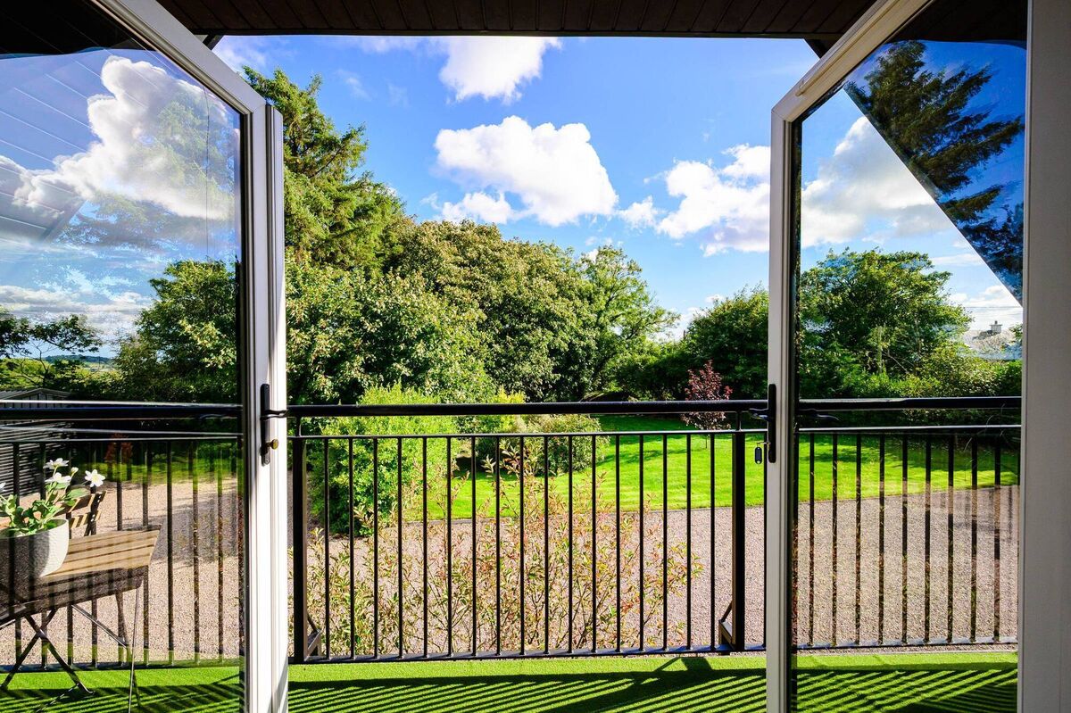 Bedroom French doors open onto balcony Bedroom French doors open onto balcony