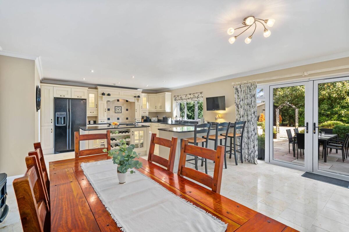 Kitchen/dining with more French doors to the patio Kitchen/dining with more French doors to the patio