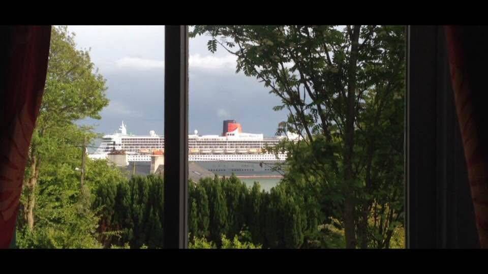 Robin Hill - the original Queen Mary passing by its windows
