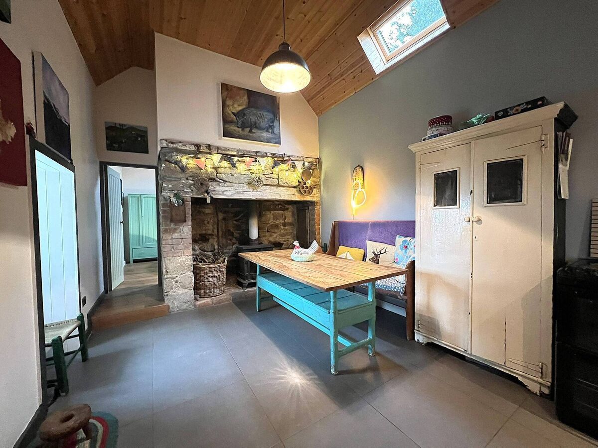 Carraturk cottage: original section with inglenook hearth and stove