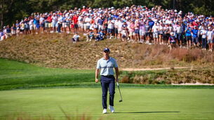 <p>RUNNING UP THAT HILL: Rory McIlroy of Europe celebrates after putting on the sixth green at Black Course. Pic: Vaughn Ridley/Sportsfile</p>