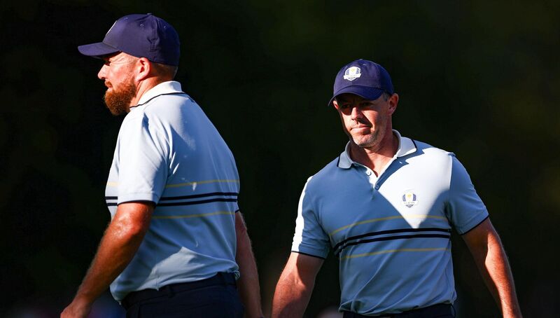SHADOW MASTERS: Shane Lowry, left, and Rory McIlroy on the 13th in their Day 1 fourball clash with the US at the Black Course, Bwthpage Black. Pic: Vaughn Ridley/Sportsfile
