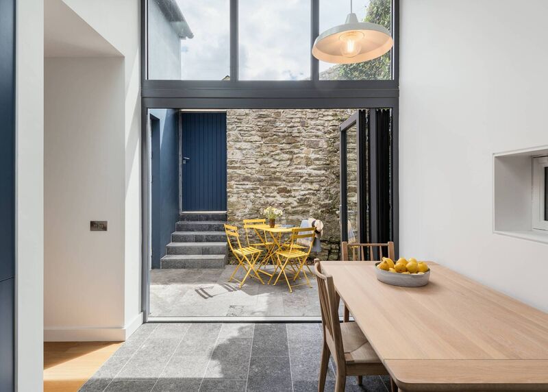 Once the sliding/folding door is in its open position, the inside and outside merges, due to the selection of the same floor finish. This means he usable space almost doubles in size. Pictures: Jed Niezgoda 