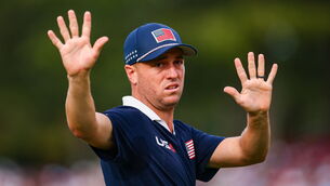 <p>Justin Thomas attempted to calm down a wild crowd at Bethpage Black down while Rory McIlroy and Shane Lowry were addressing shots during the Saturday fourballs at the Ryder Cup. Pic: Vaughn Ridley/Sportsfile</p>