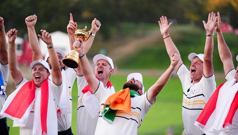 Shane Lowry celebrates with the Ryder Cup Trophy. Pic: Mike Egerton/PA Wire.