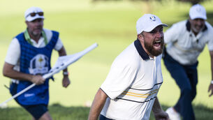 <p>WINNING FEELING: Shane Lowry celebrates making the winning putt to retain the Ryder Cup for Team Europe. Pic: ©INPHO/Matthew Harris</p>