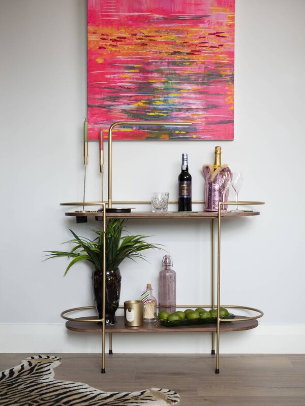 One of Louise’s paintings adorns the walls, painted in Dulux Heritage Romney Wool. One of Louise’s paintings adorns the walls, painted in Dulux Heritage Romney Wool.