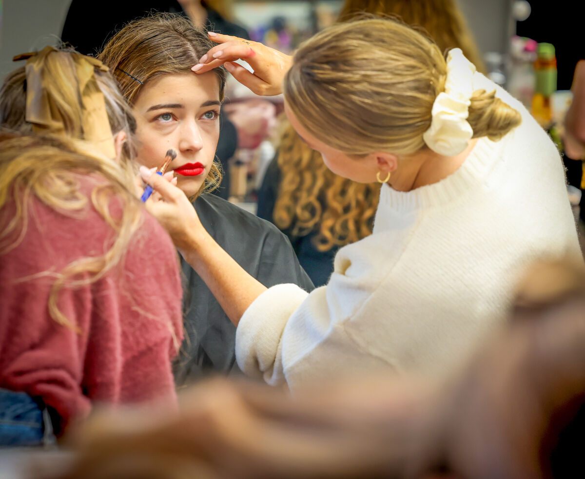 Film set designer Lilly O’Donnell getting her make-up done before filming.