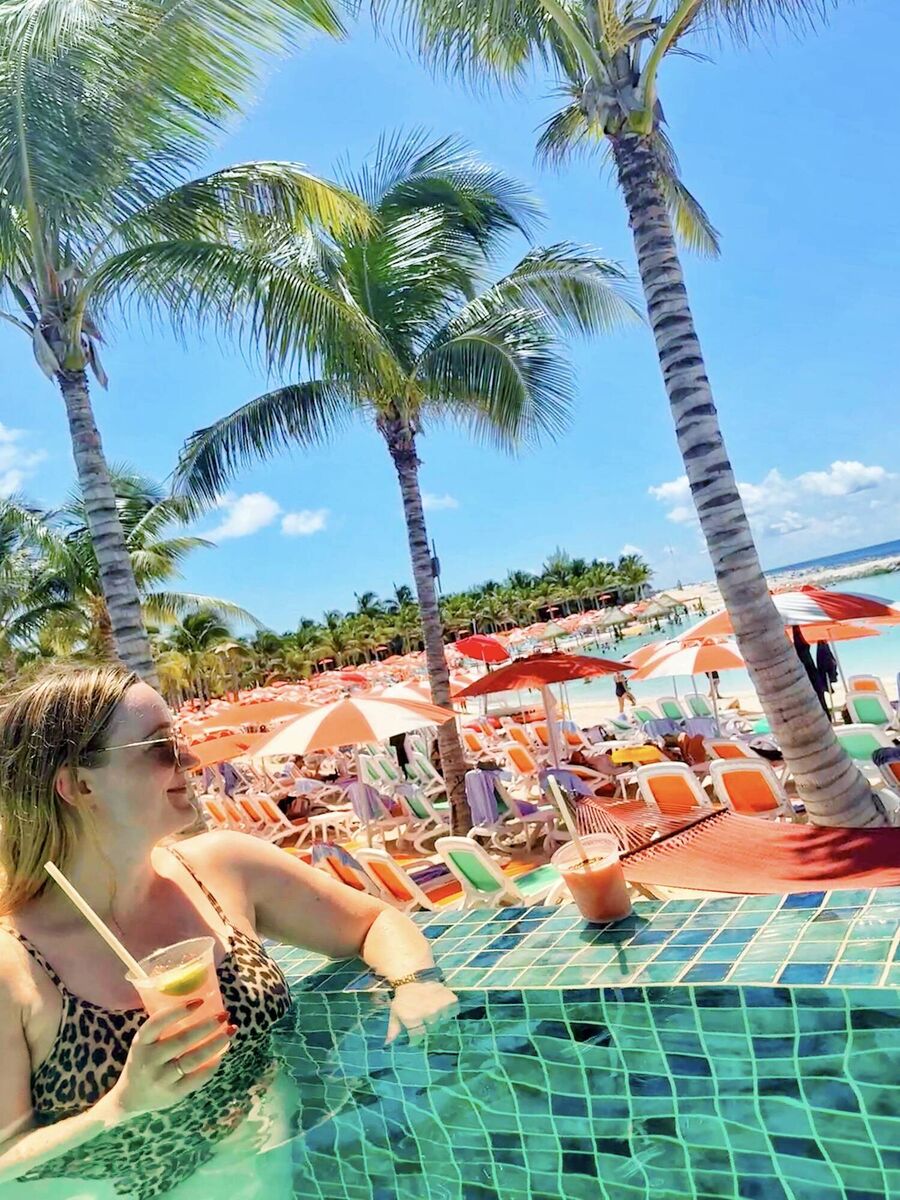 Denise O'Donoghue enjoying a cocktail at Hideaway Beach on CocoCay.
