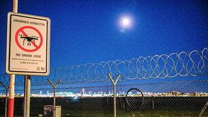 A sign prohibiting drones is seen at Munich Airport (Enrique Kaczor/dpa via AP/PA)