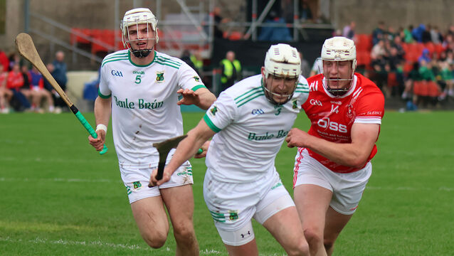 <p>CLOSE QUARTERS: Keith Punch of Ballybrown fights for possession against Doon's Pat Ryan. Pic: Brendan Gleeson</p>