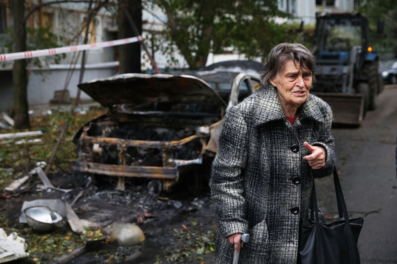 An elderly woman walks past a house destroyed by a Russian strike in Zaporizhzhia, Ukraine on Sunday. Our European partners are focused on how to deter and, if required, defend against a Russian invasion of an EU member state. Photo: AP/Kateryna Klochko