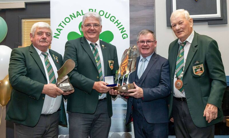 Eamonn Tracey from Carlow, winner of the Conventional senior competition, is presented with the Esso Supreme trophy, NPA Trophy and gold medal by NPA chairman John Deery, Sean O'Brien, leas-cathaoirleach of Offaly County Council, and NPA president Mick Mahon at the Ploughing 2025 awards in Tullamore on Sunday. Picture: Alf Harvey Eamonn Tracey from Carlow, winner of the Conventional senior competition, is presented with the Esso Supreme trophy, NPA Trophy and gold medal by NPA chairman John Deery, Sean O'Brien, leas-cathaoirleach of Offaly County Council, and NPA president Mick Mahon at the Ploughing 2025 awards in Tullamore on Sunday. Picture: Alf Harvey