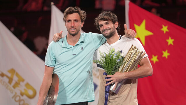 <p>Valentin Vacherot (right) beat his cousin Arthur Rinderknech to win in Shanghai. Picture: Andy Wong/AP</p>