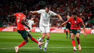 <p>IRELAND'S GRIT: Ireland's Evan Ferguson in action against Nuno Mendes, left, and Goncalo Inácio of Portugal. Picture: Stephen McCarthy/Sportsfile</p>