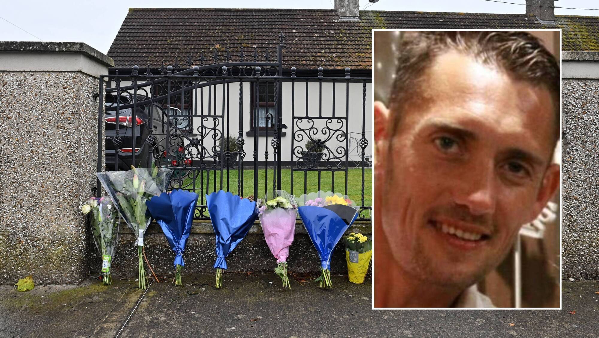 Flowers at the residence on Rockview Terrace, Doneraile, Co Cork, where the body of postman Barry Daly was discovered on Sunday morning. Picture Dan Linehan
