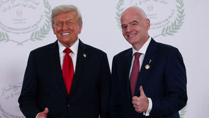 <p>US President Donald Trump and Fifa president Gianni Infantino pose for a photo at the Sharm El Sheikh Peace Summit in Egypt. Pic: Suzanne Plunkett/PA Wire</p>