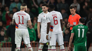 <p>Following a heated exchange with Tigran Barseghyan on the touchline, the Southampton playmaker was sent tumbling to ground, having felt the force of the Armenian number 11’s already bandaged head. Pic: James Crombie/Inpho</p>