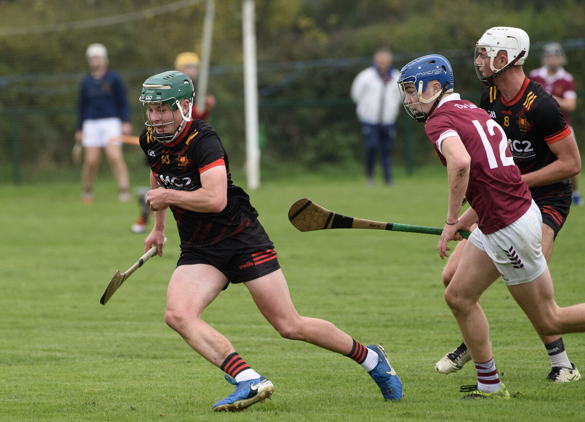  Michael Quill of CBC breaks away from Jack Bevans. Picture: Dan Linehan