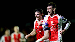 <p>St Pat's Simon Power celebrates scoring the winner against Shamrock Rovers with Mason Melia at Richmond Park on Friday night. Picture: Ryan Byrne/Inpho</p>