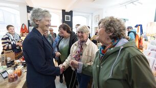 <p> Catherine Connolly meeting local people in Milltown Malbay in Co Clare while canvassing on Saturday. Picture: Eamon Ward</p>