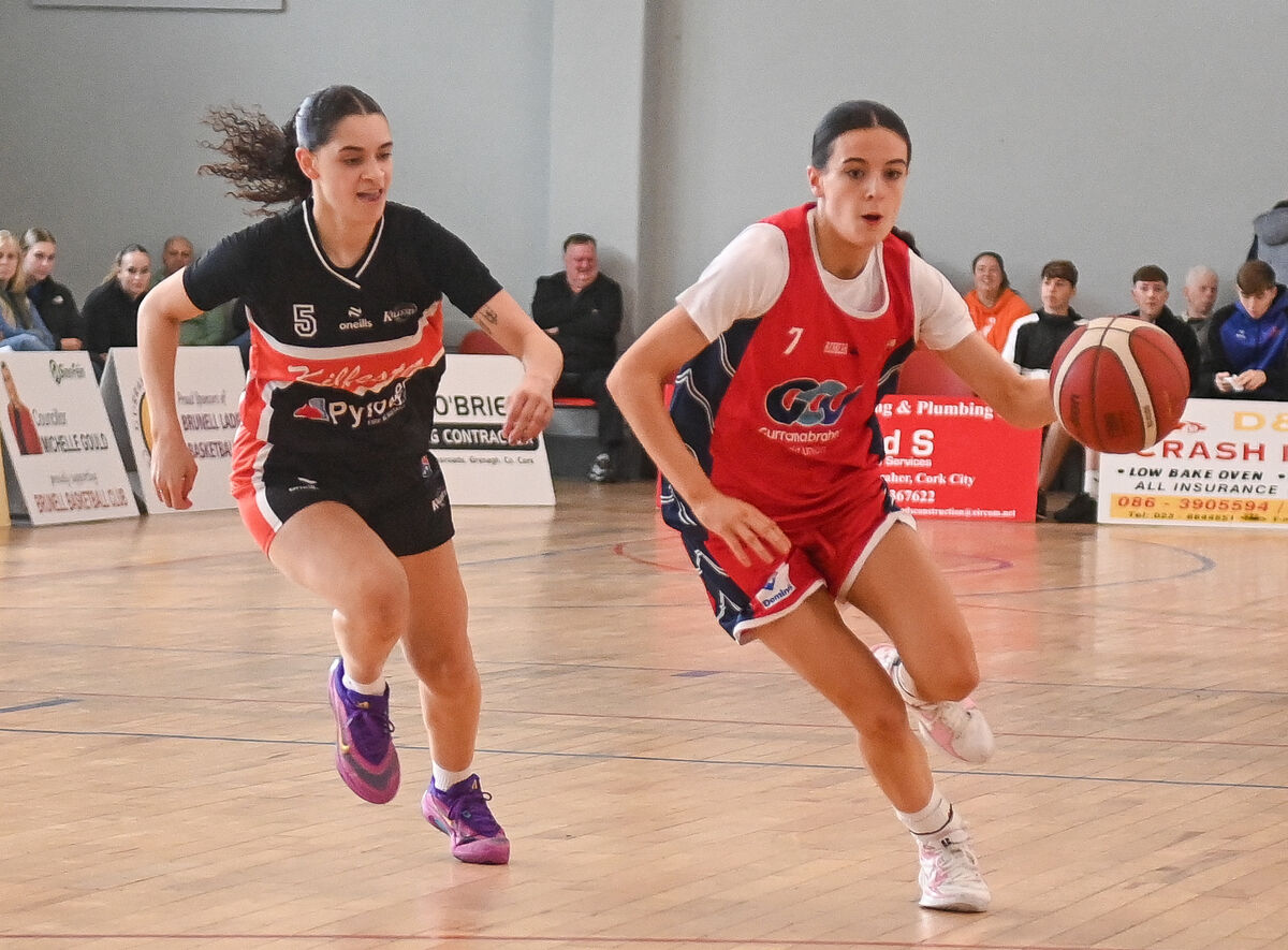  Brunell's Ava Walshe races past Killester's Leilani Turner during their Women's Super League clash at the Parochial Hall. Picture: David Keane