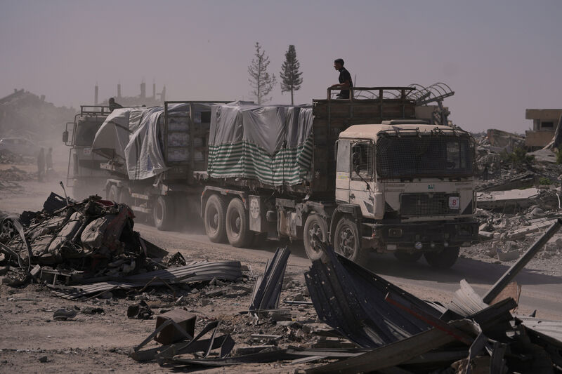 Trucks carrying humanitarian aid driving through Khan Younis in the southern Gaza Strip on Monday. Picture: Jehad Alshrafi/AP Trucks carrying humanitarian aid driving through Khan Younis in the southern Gaza Strip on Monday. Picture: Jehad Alshrafi/AP