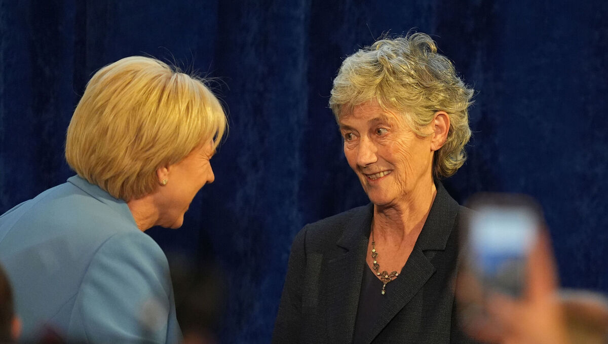 Catherine Connolly speaking to fellow candidate Heather Humphreys at Dublin Castle. Picture: Niall Carson/PA