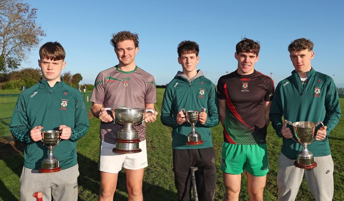  James Lordan and Shane Kingston of Ballinora GAA with Under 15 winning Captains, Paddy Burke, David Fenton and Charlie Noonan. Picture: Jim Coughlan.