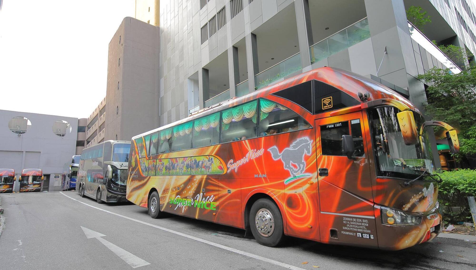 The bus less travelled to Kuala Lumpur: 'The pavements are packed with people, the streets jammed with cars'